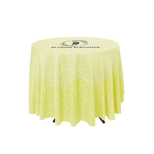 A yellow Nexis™ Café Tablecloth with an elegant overhang displayed on a round table, featuring a dye sublimation printed logo.